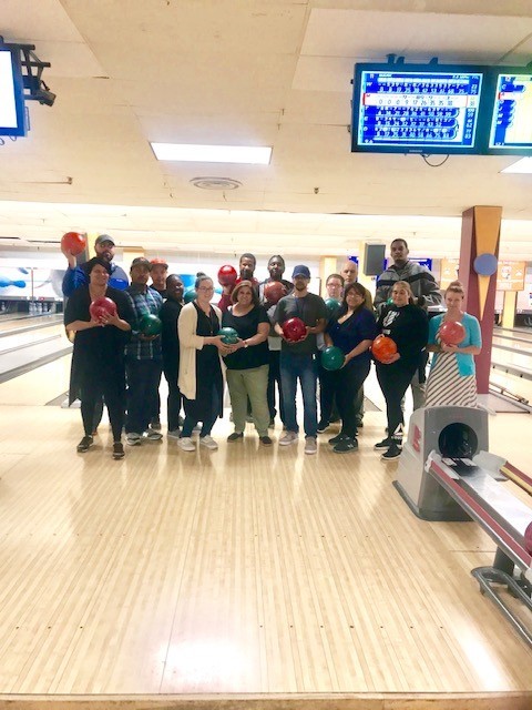 clients of pathway home program are having fun bowling