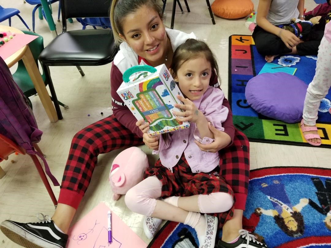 mother and daughter at the pajama storytime event at the early childhood development center
