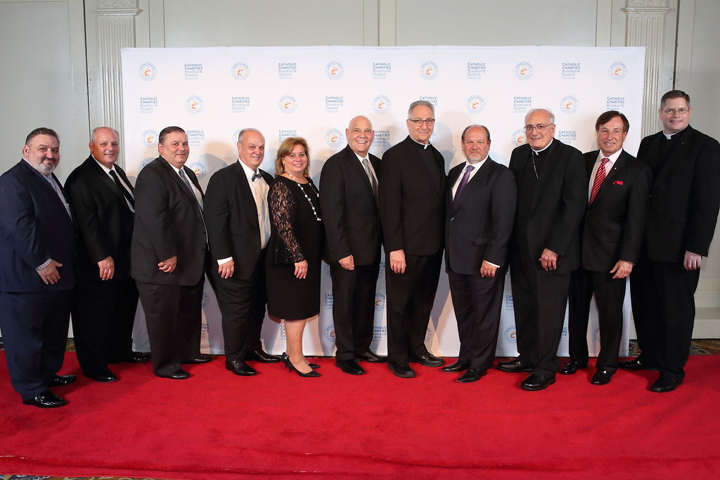 Frank Fusaro, Co-Founder and President of Forum Group, received the Bishop Joseph M. Sullivan Service Award, and six employees of Catholic Charities Brooklyn and Queens, John Belfon, Sarai Bosques, Josefa Castro, Elaine Merchant, Jessica Russell and Wendy Schwartz received the John J. Farrell Award.