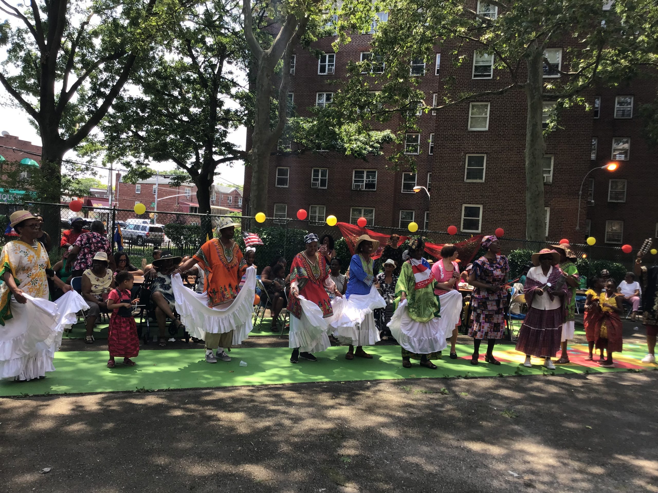 group of dancers celebrating the Canboulay Extravaganza 2019 at the glenwood senior center