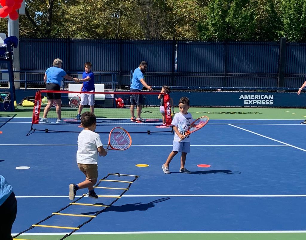 Kids playing tennis for the annual world renowned tennis competition