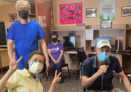 group of older adults having fun at an event