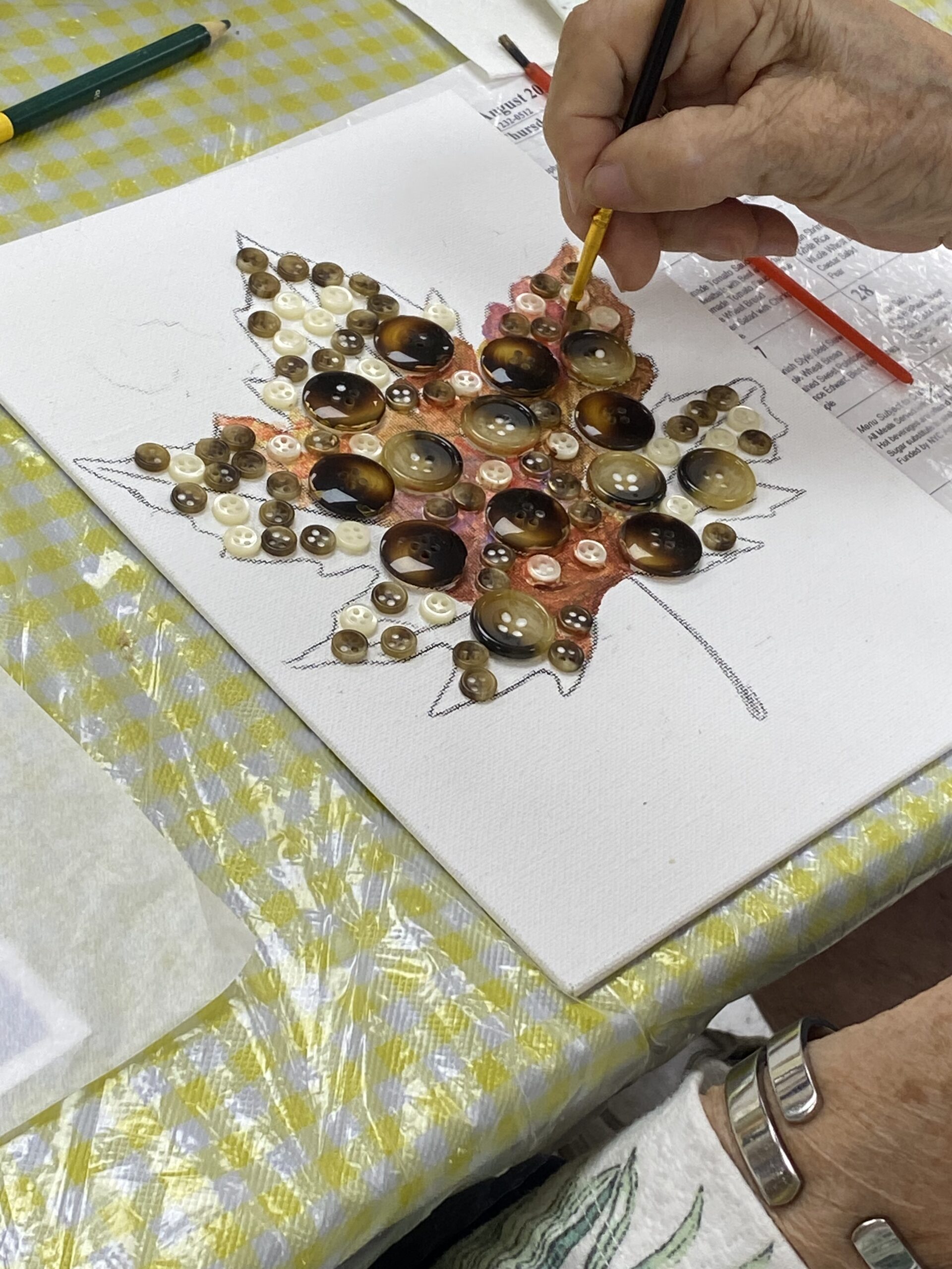 Narrows Senior Center Painting Class of a leaf with buttons