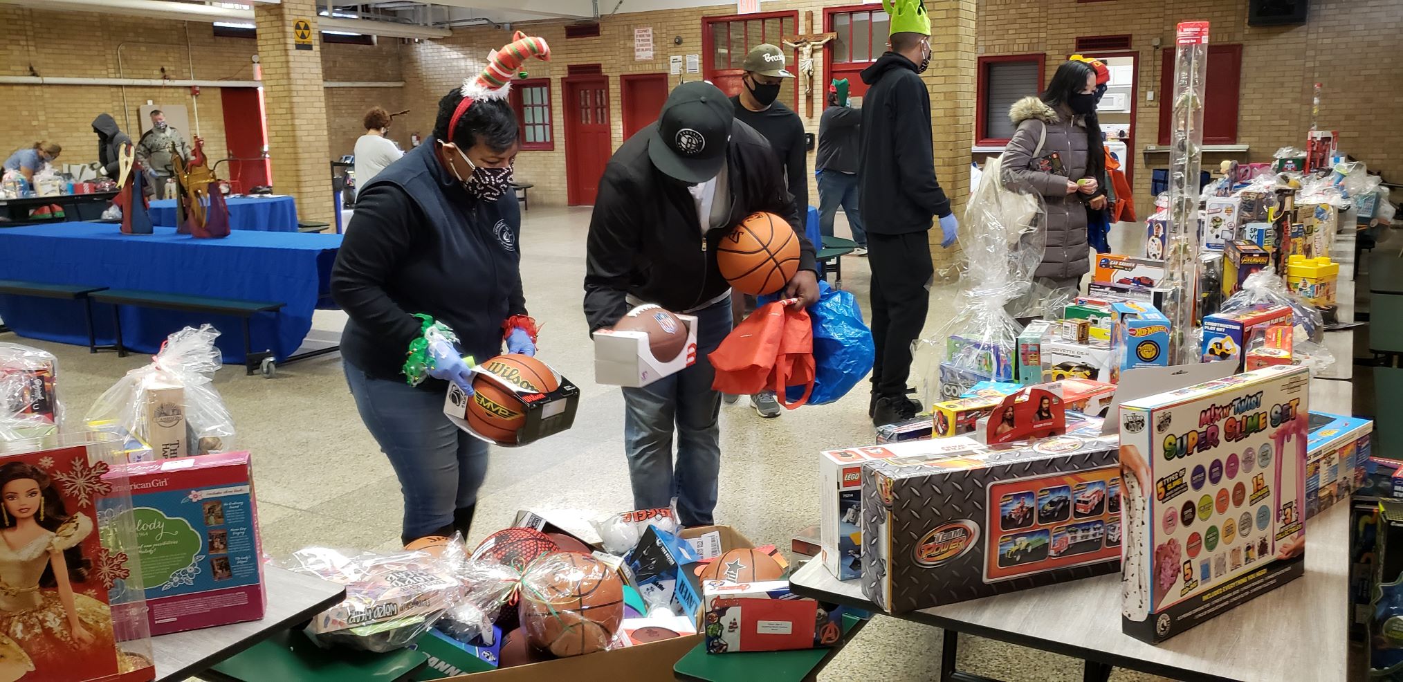 Catholic Charities Brooklyn and Queens organized a toys distribution to families in need and Helping Spread Christmas Joy to Families in Need!