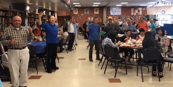 members and friends of the bayside senior center celebrating father's day