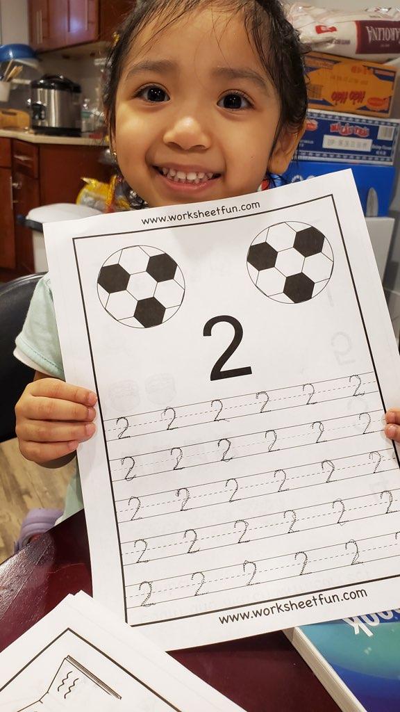 little girl of early childhood services is learning cognitive skills at home