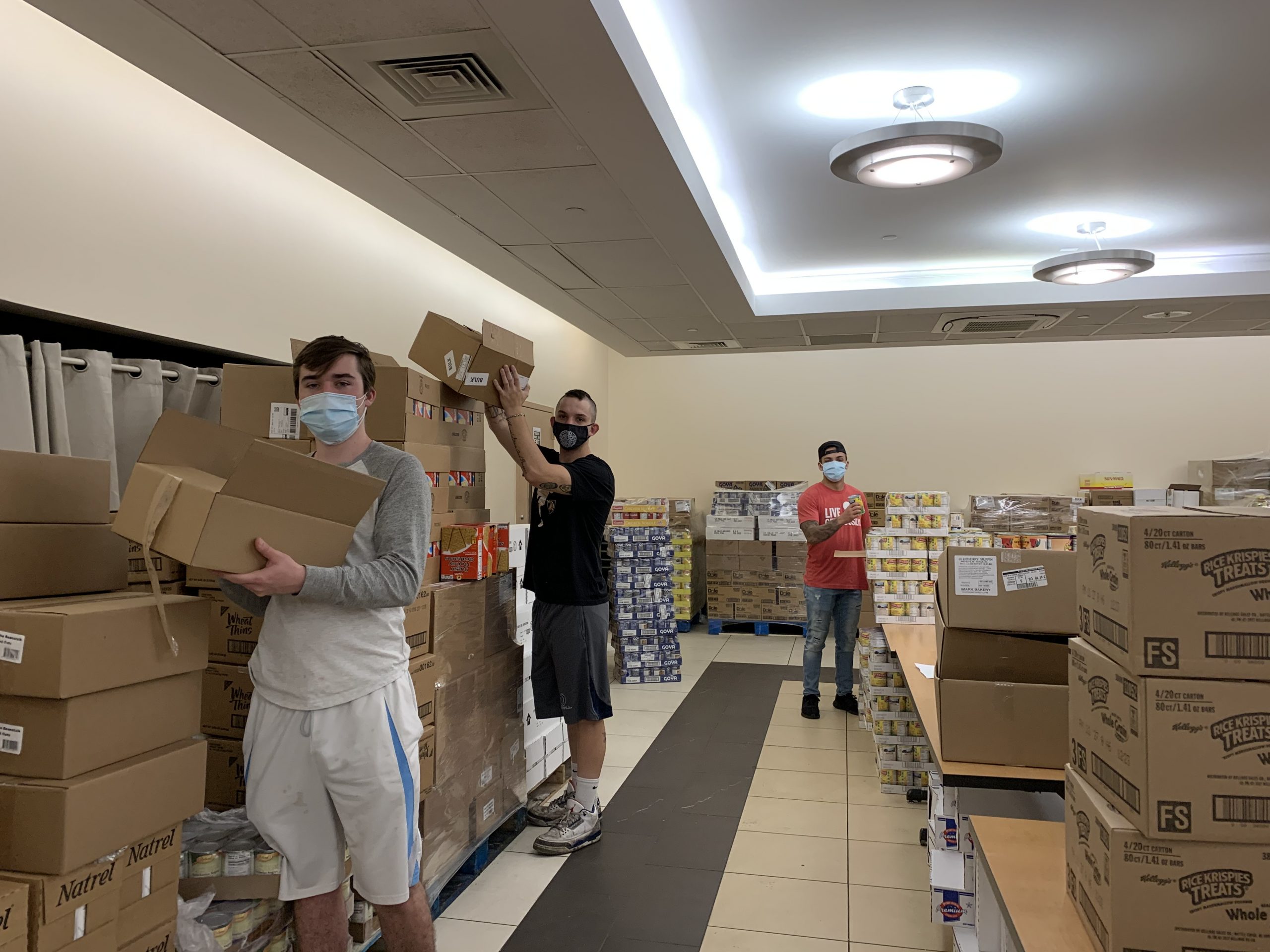 preparing the 300 food bags for brooklyn senior residents
