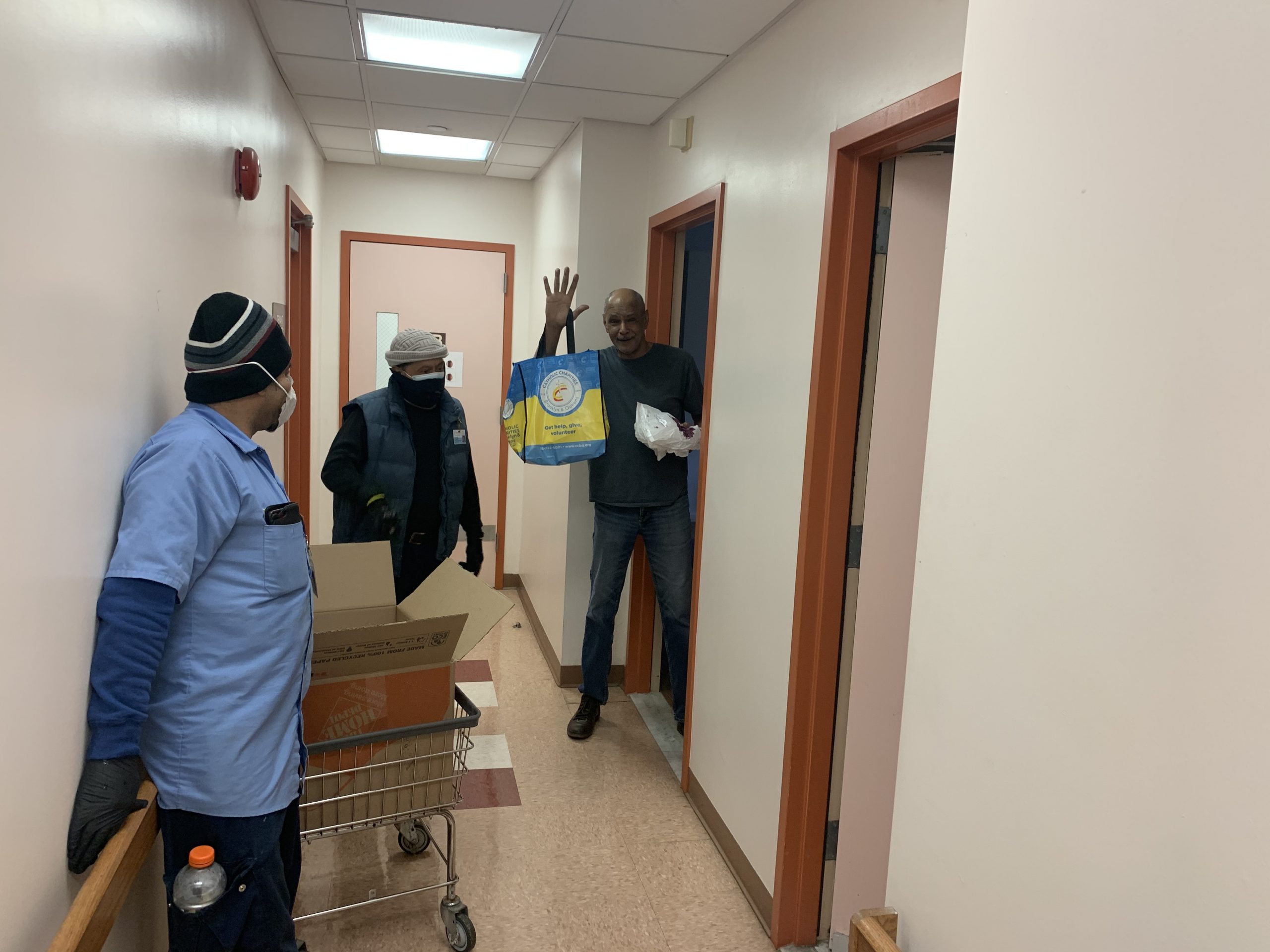 catholic charities brooklyn and queens Frontlines for the Greater Good assisting at an older adult's home