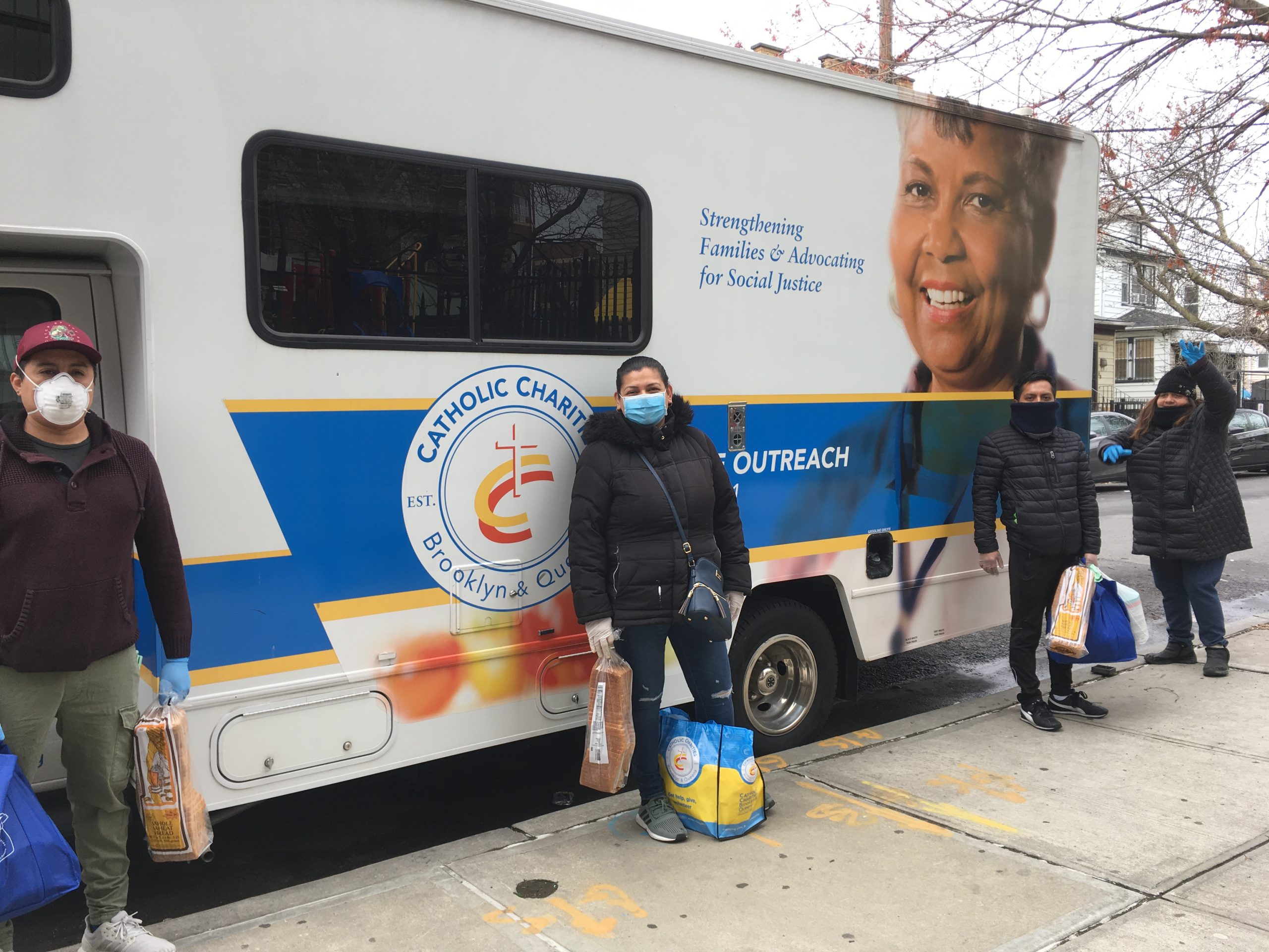 participants standing in front of the Pop-Up Food Distribution in Corona, Queens