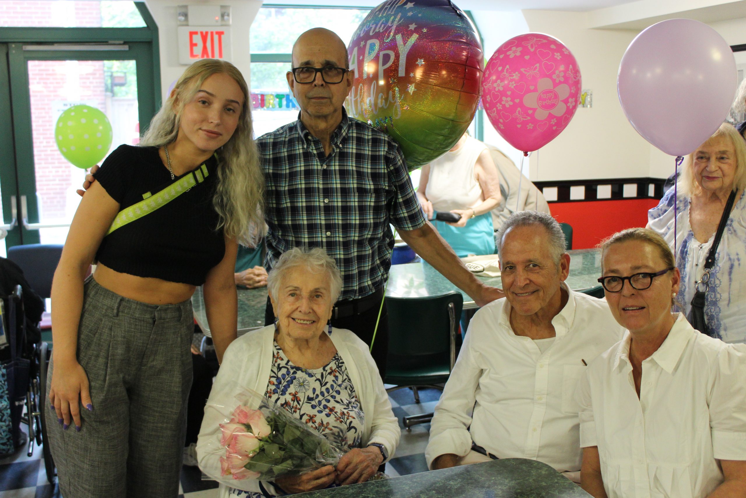 celebrating the 100th birthday of Vivian Levy surrounded with her family
