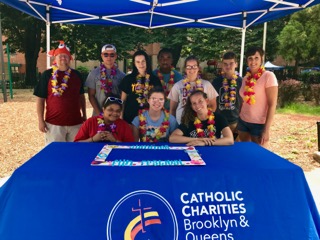 catholic charities members at the fourth annual summer fun festival
