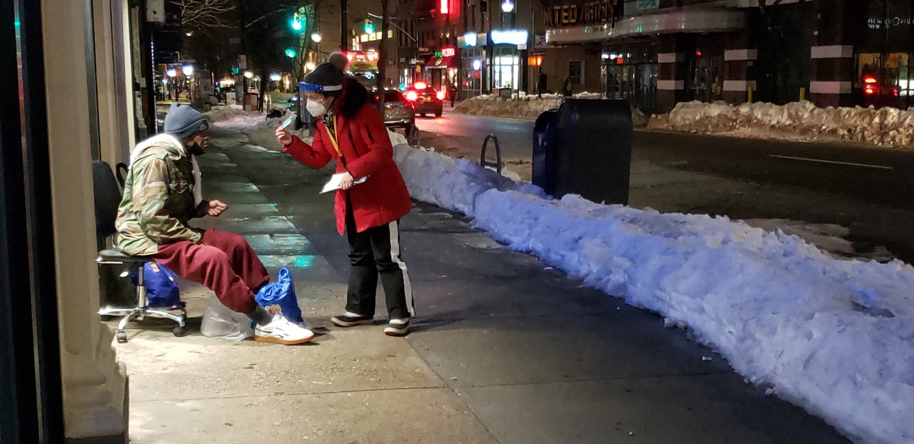 a catholic charities brooklyn and queen representative assisting a Homeless New Yorkers Amid COVID-19
