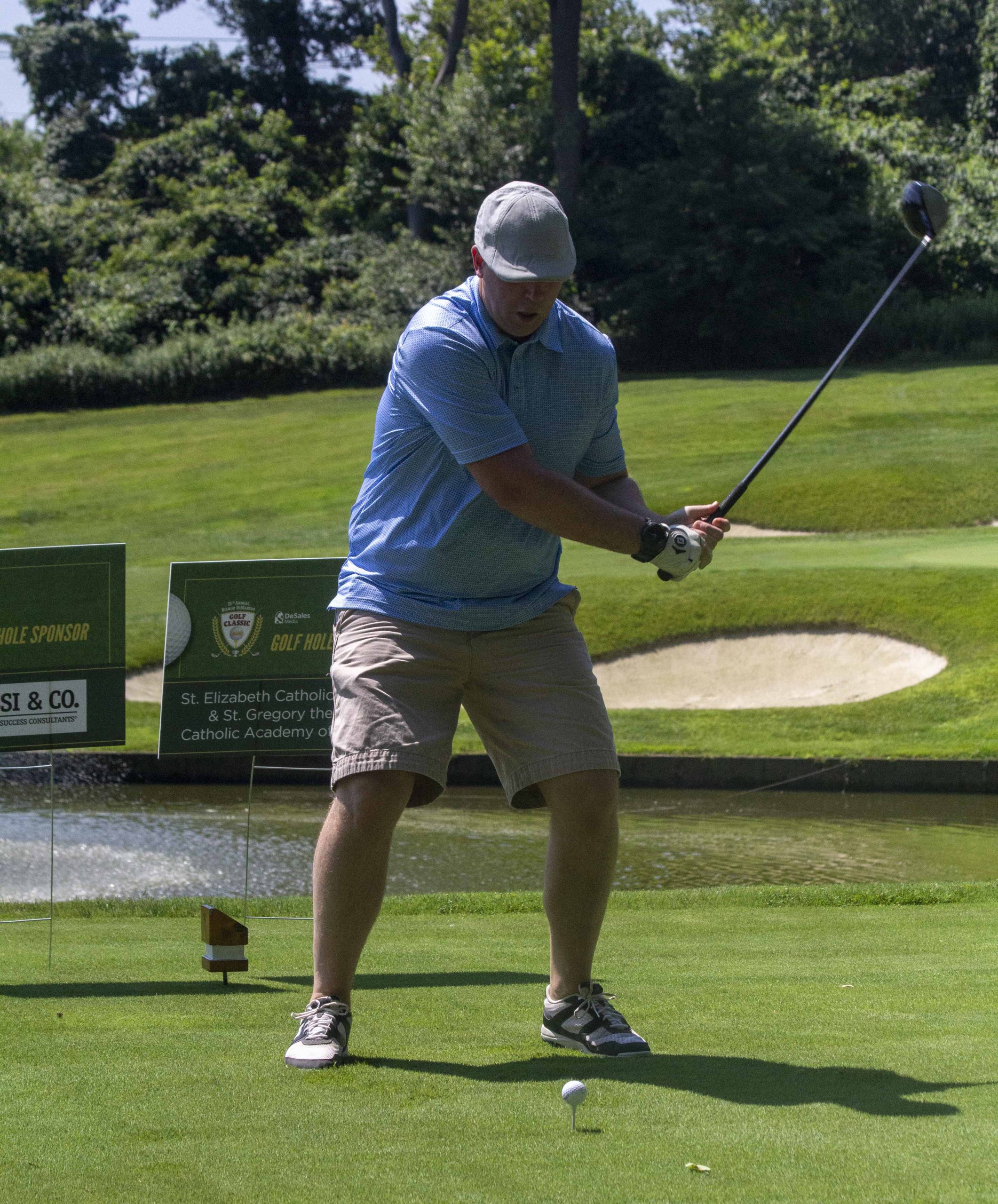 a golfer playing at the 25th annual bishop dimarzio golf classic