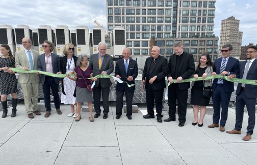 Pictured from left to right: Jamie Bemis&nbsp;CEM, EIT, Account and Market Development Manager-Affordable Housing, Bright Power; Jeffrey Perlman, CEO, President and Founder, Bright Power; David Downs, Deputy Director, Catholic Charities Progress of Peoples Development Corporation; Emmie Glynn Ryan, Esq., Chief of Staff and General Counsel, Catholic Charities Brooklyn and Queens; Lydia Tom, Senior Advisor, Initiatives, Enterprise Community Partners; Joseph Giamboi, Chairman, Board of Director, Catholic Charities Progress of Peoples Development Corporation; Robert B. Catell Chairman, Advanced Energy Research & Technology Center (AERTC) of Stonybrook University; Most Reverend Nicholas DiMarzio, Ph.D., D.D., Bishop of Brooklyn; Very Reverend Patrick J. Keating, Esq., Deputy Chief Executive Officer, Catholic Charities Brooklyn and Queens; Alexandra Hohauser, Associate, Nixon Peabody LLP; Timothy McManus, Senior Vice President, Catholic Charities Progress of Peoples Development Corporation; and Christopher M. Rogers, Project Manager, NY-Sun, NYSERDA.