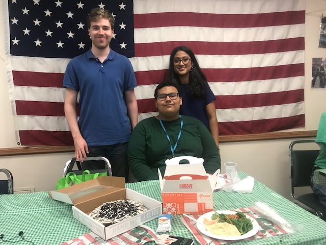 Employees celebrate with participants their last day to the summer youth employment program