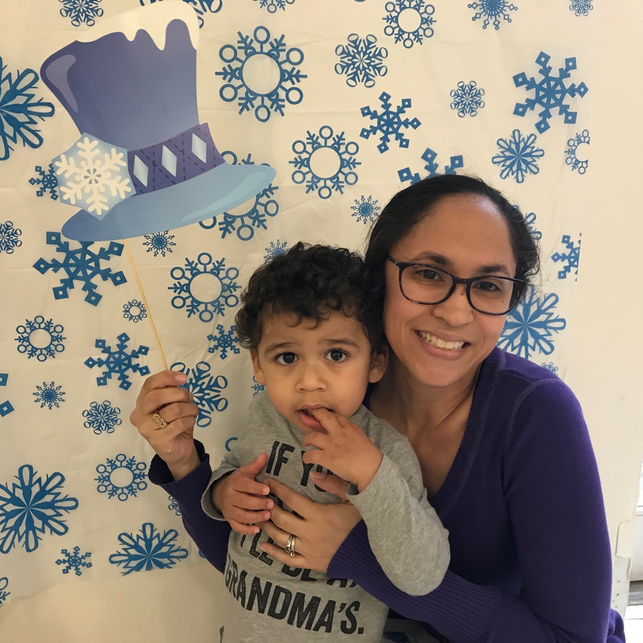 a mother and her child celebrating winter wonderland