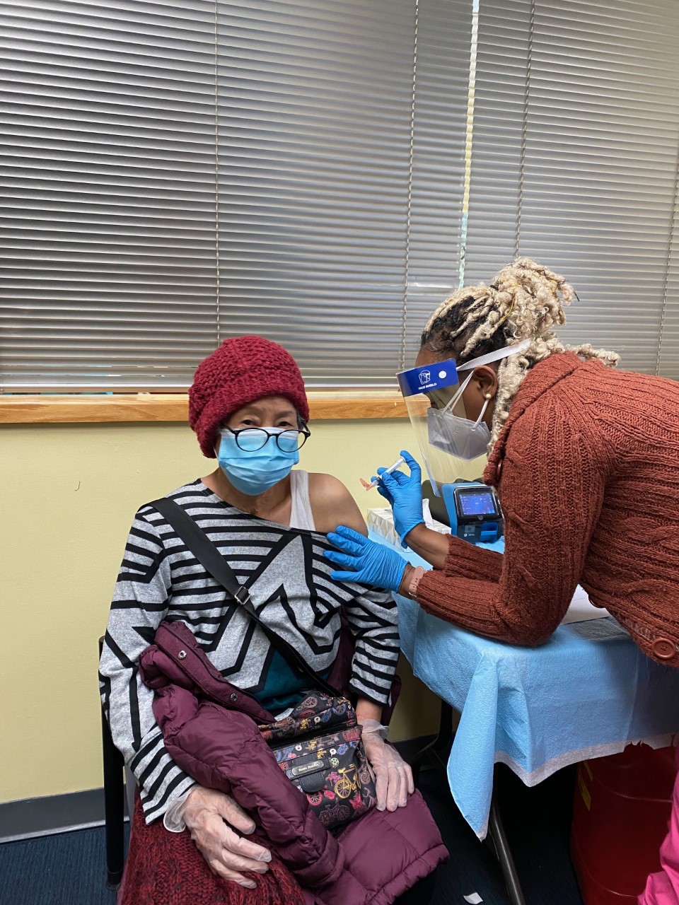 a senior is gettinG her second vaccine for covid 19