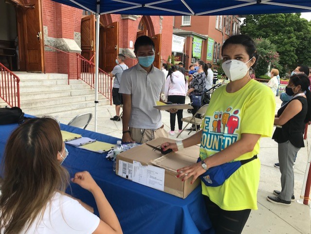 team outreach pop up event gathering in front of our lady of sorows church