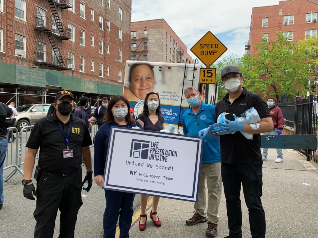 participants donating and distributing masks during covid