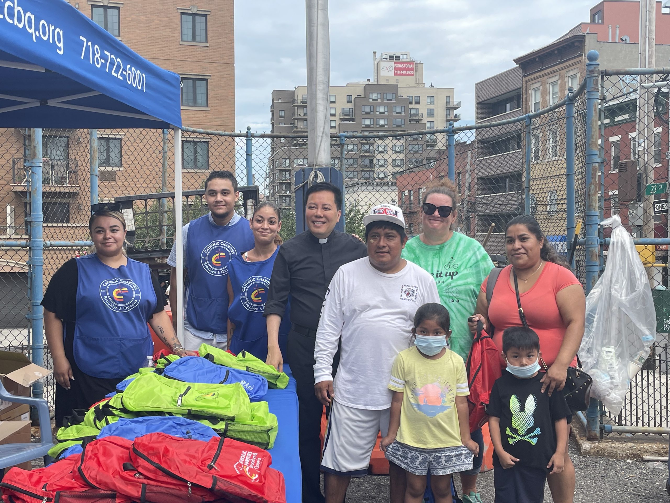 Family and volunteers at Catholic Charities Brooklyn and Queens 12th Annual Kids Fun Day in Astoria.