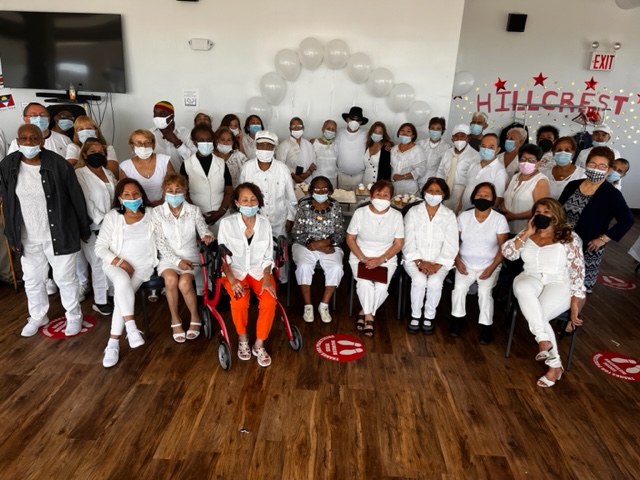 Senior center members in their white party outfits!