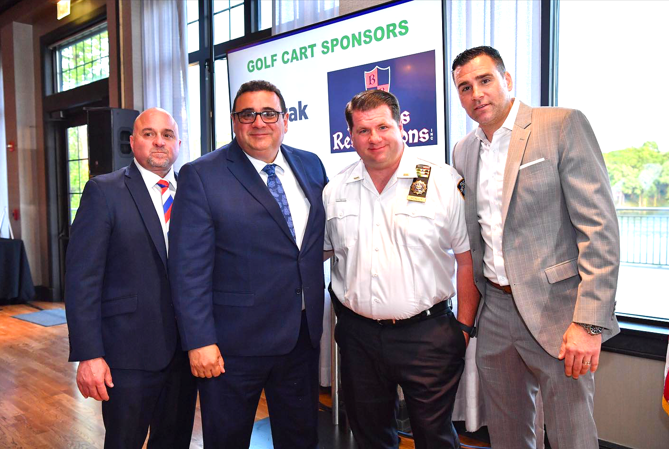 John Rafferty Queens Ledger John Rafferty (far right), Is Being Honored It This Year’s Catholic Charities Gala. Photo Courtesy of John Rafferty. (Photo: Queens Ledger)