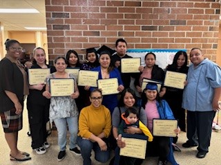 group of parents celebrating the parent nutrition class graduation