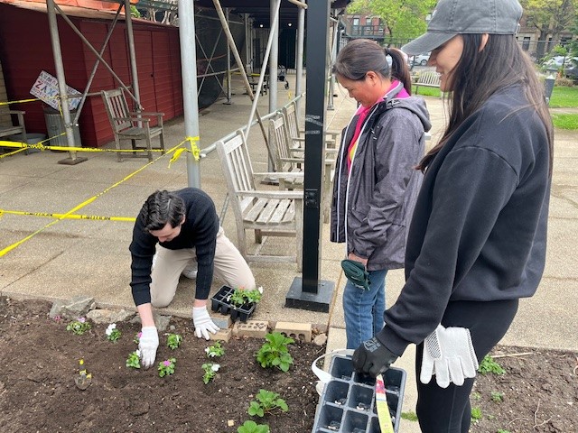 next generation committee volunteers gardening in park slope