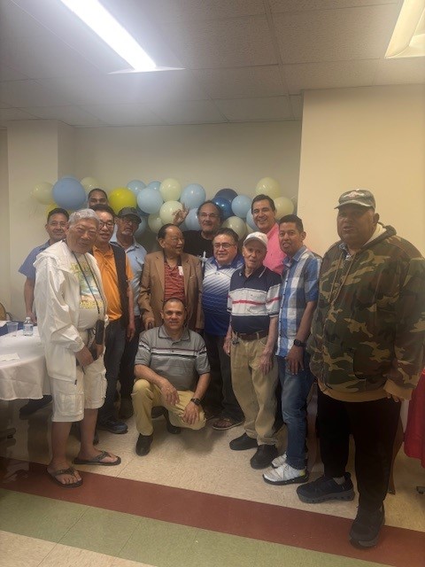 group of fathers during father's day at the saint paul the apostle senior apartments