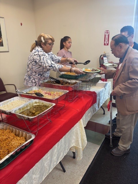 food being served during father's day at saint paul the apostle senior apartments