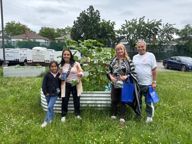 community members at the bridge building gardening project in howard beach