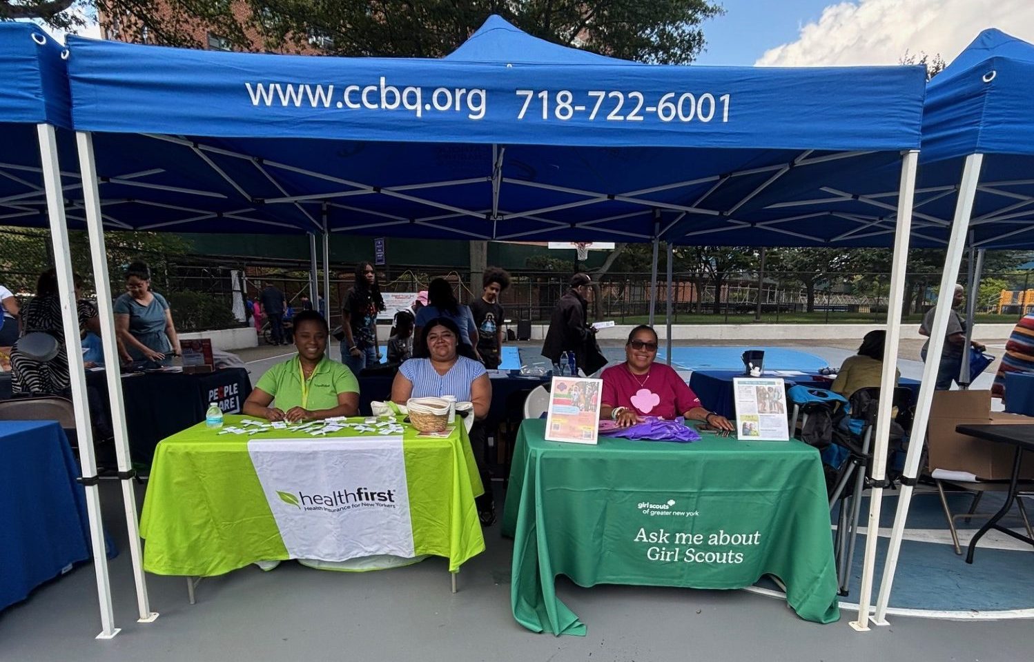 Healthfirst booth and Girl scouts booth at the annual summerfest