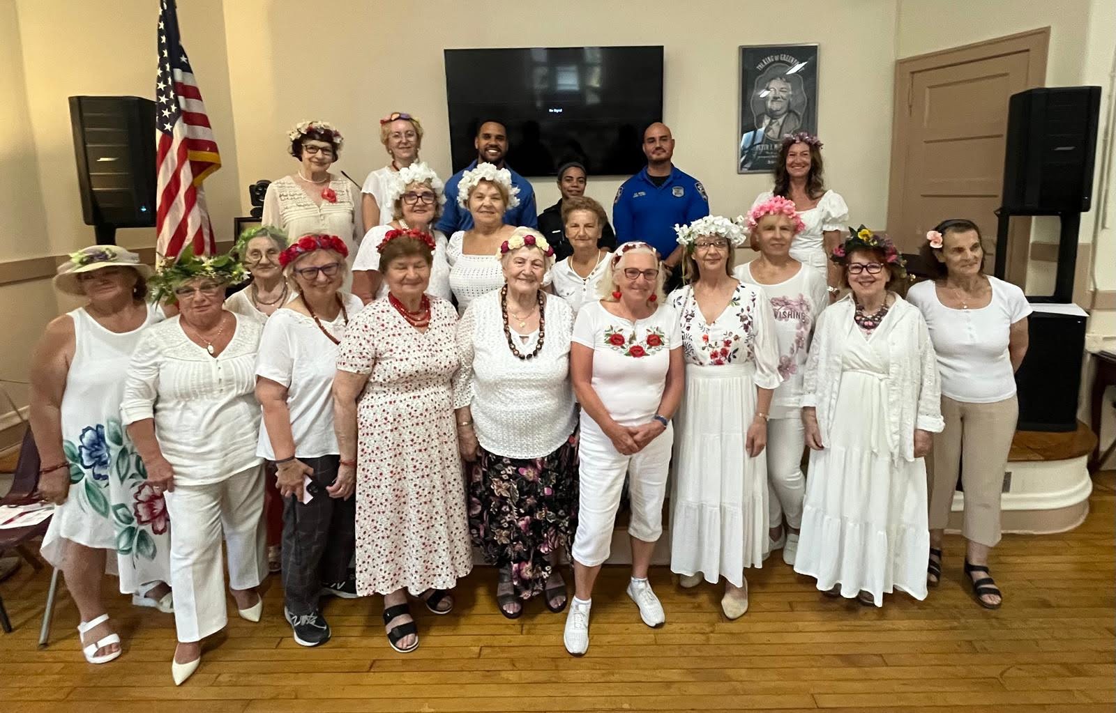 catholic charities pete mcguinness older adult residents dressed all in white