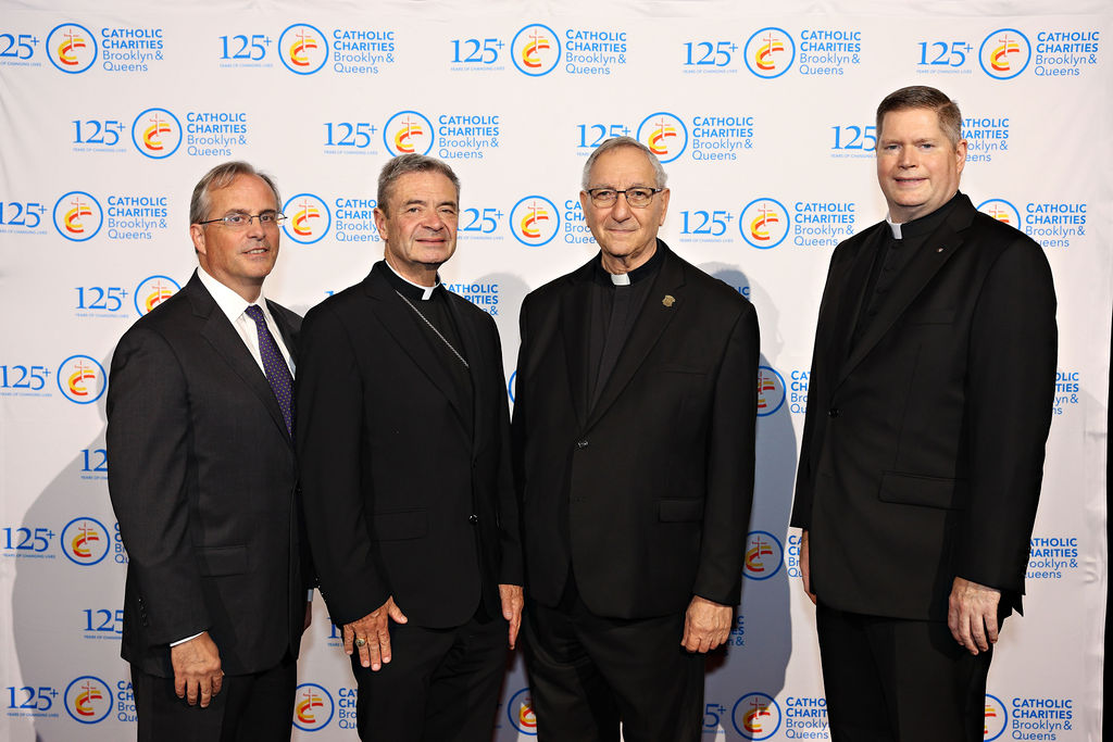 From the left: Deacon John Warren; Very Reverend Patrick J. Keating, Esq., Catholic Charities Brooklyn and Queens Deputy CEO; Bishop Robert J. Brennan; and Rev. Msgr. Alfred LoPinto, Catholic Charities Brooklyn and Queens President and CEO.
