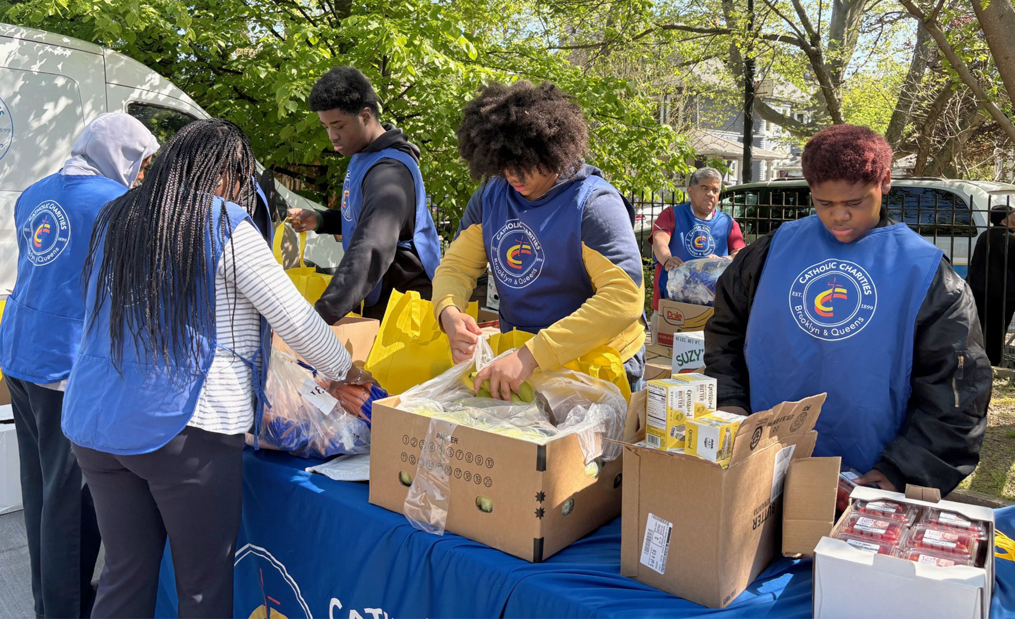 volunteers packing boxes