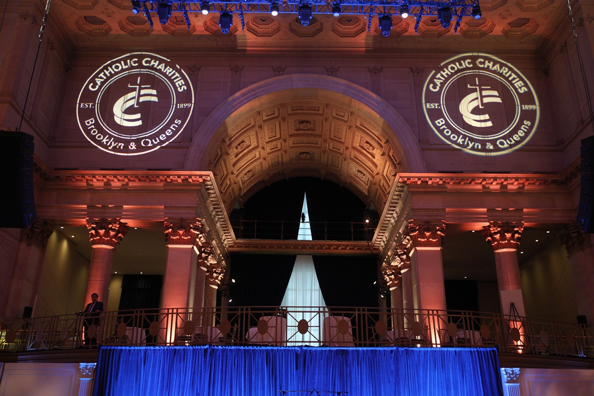 inside of the venue holding the bishop's humanitarian award dinner